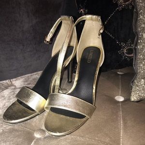 Gold strappy heels